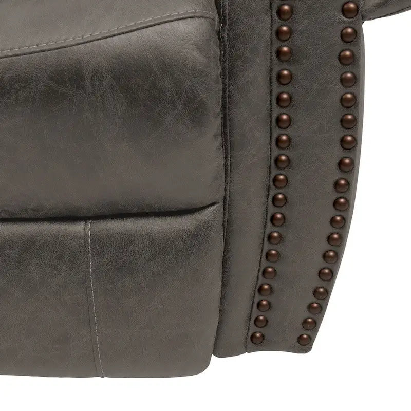 Extragroßer Wandabstandssessel aus Kunstleder mit gerollten Armlehnen